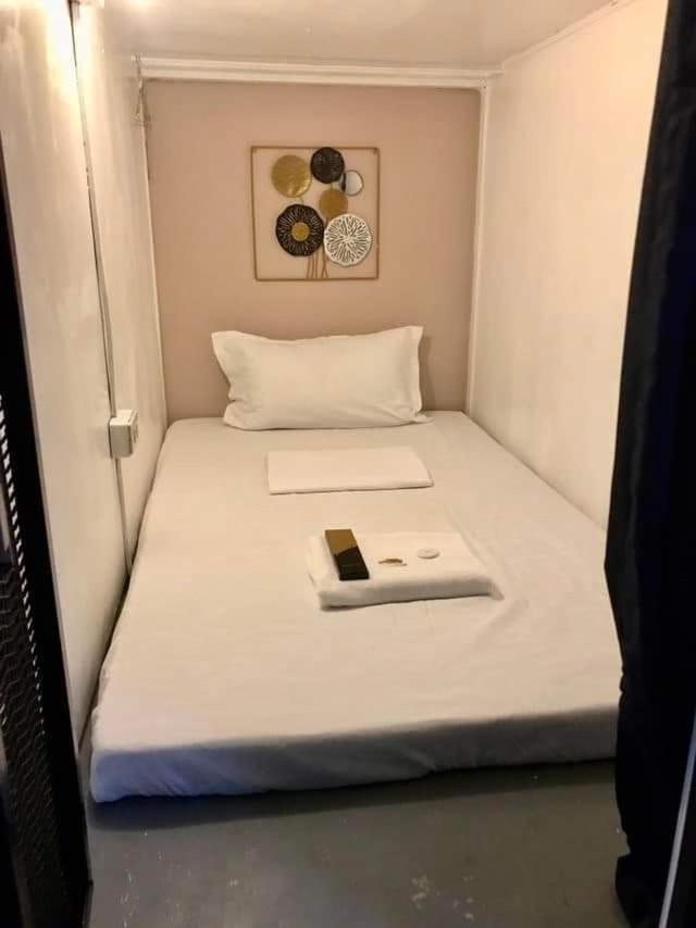 טאגיג Budget Transient Capsule Room Mirasol Near Bgc מראה חיצוני תמונה